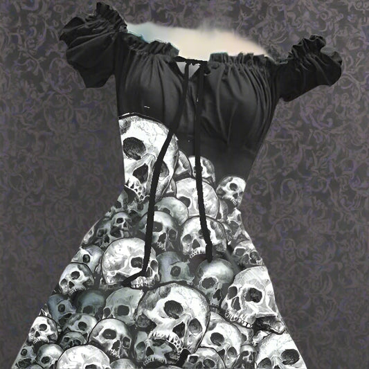 Black off-shoulder top with skull patterned skirt on a mannequin.